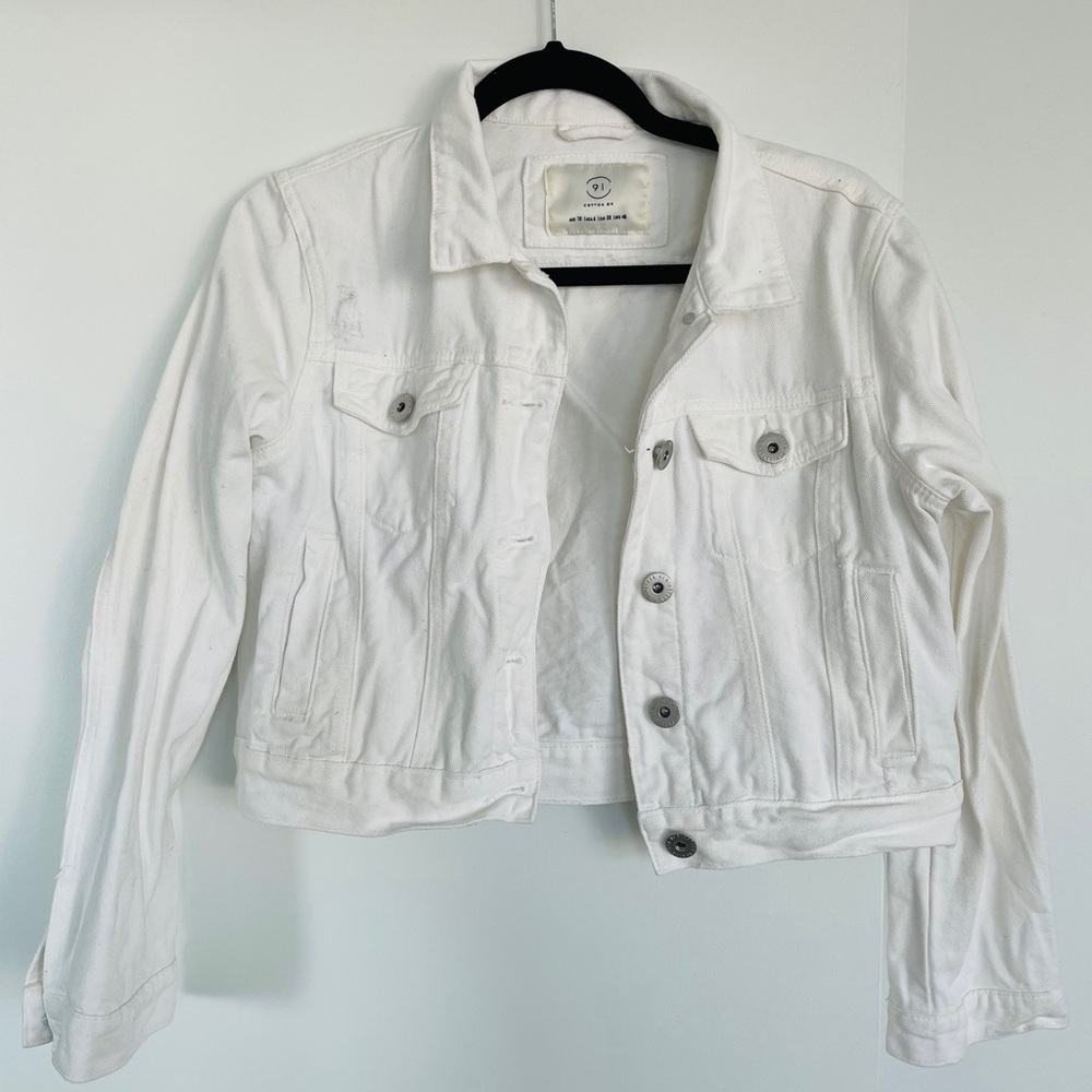 white slightly distressed cropped jean jacket